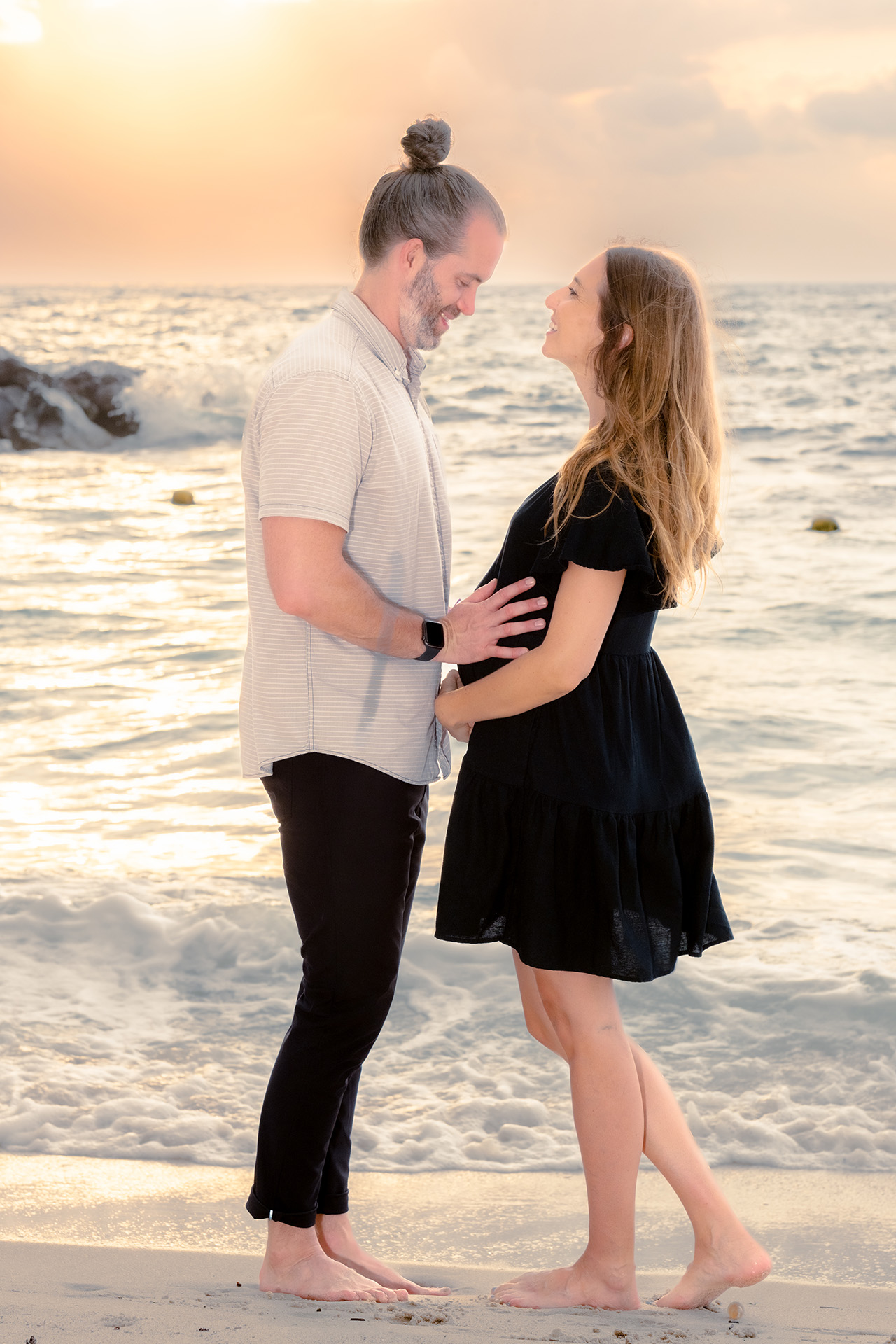 couple maternity photos Puerto Vallarta beach